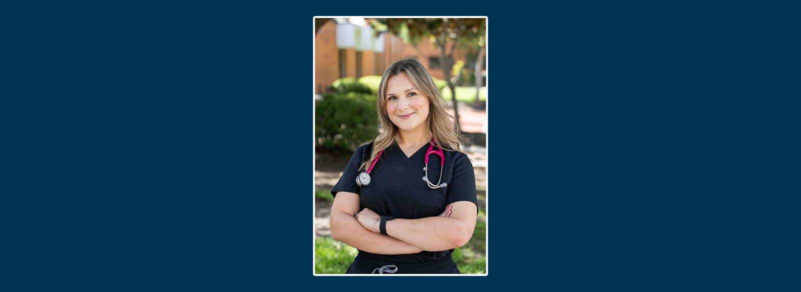 Graduate of the Lee College Nursing Program, Mariana Fuentes stands with arms crossed and stethoscope around her neck.